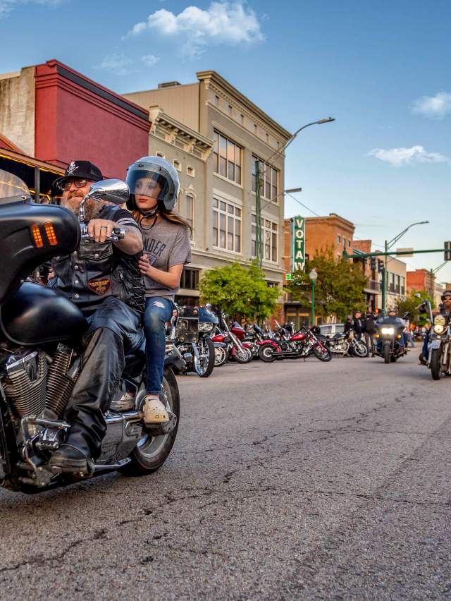 Motorcyclists bike along Garrison Avenue in Fort Smith, Arkansas.