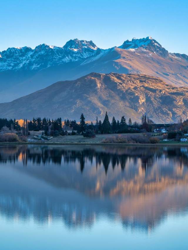 Snow capped mountain reflections on Lake Hayes in winter