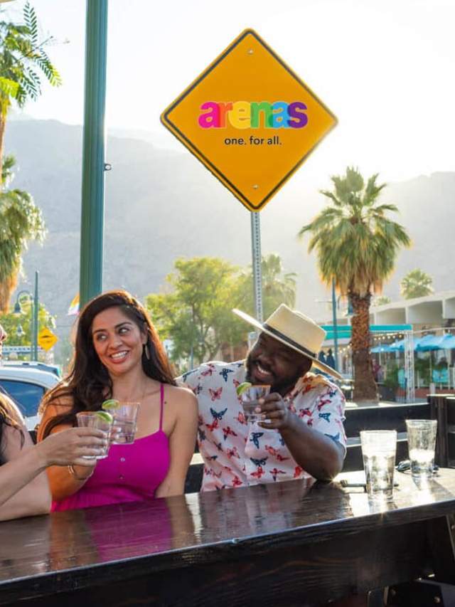 Friends enjoying drinks at blackbook bar in palm springs