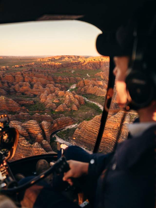 HeliSpirit helicopter flying over the domes in the Bungles
