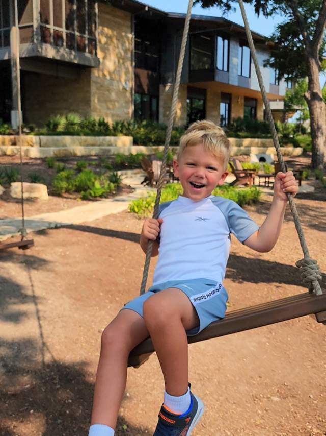 Recreation and Community Connection: 🥇 1st Place: "Logan Swinging At The Library" by Michael Berhnhardt