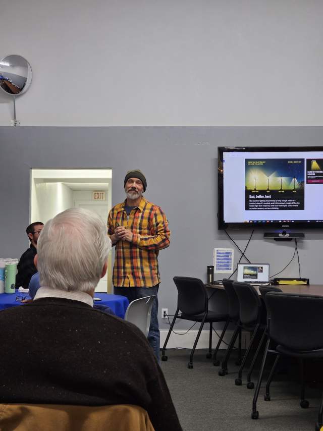 John Mueller gives sustainable tourism presentation about Keweenaw dark skies and light pollution.
