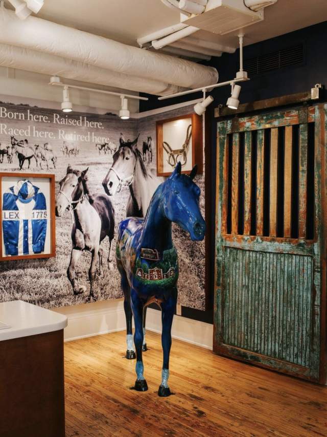 Painted blue horse inside the Lexington Visitors Center