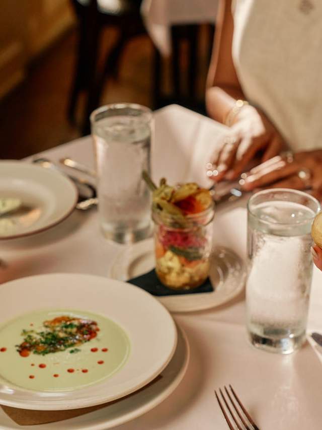 A photograph of lunch on the table at La Petite Grocery in New Orleans