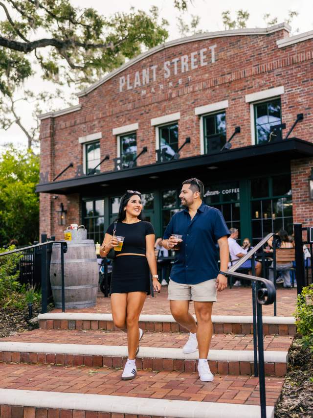 Couple walking at Plant Street Market in Winter Garden