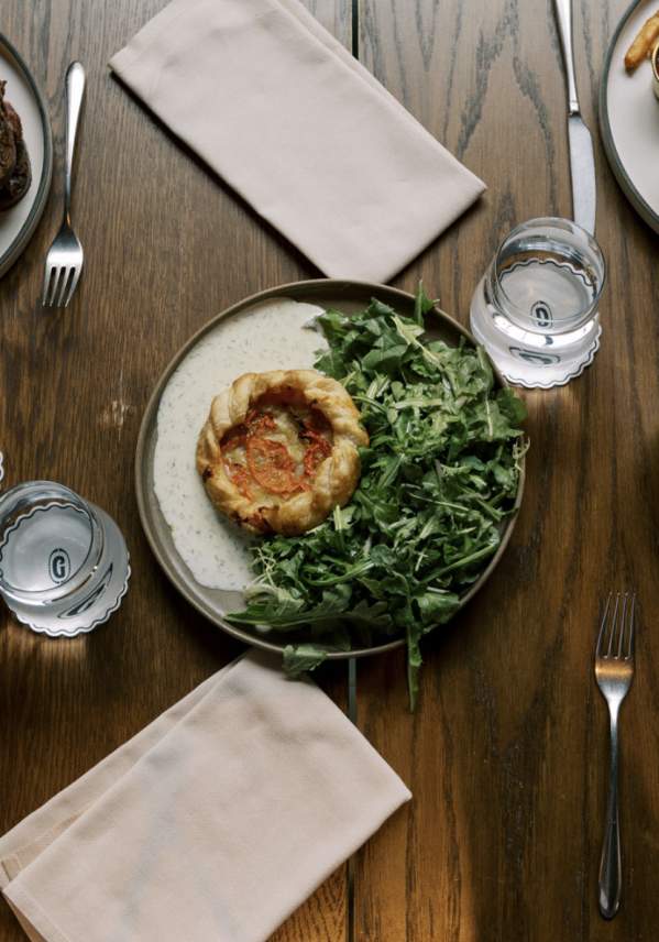 Overhead shot of a table with plates of food