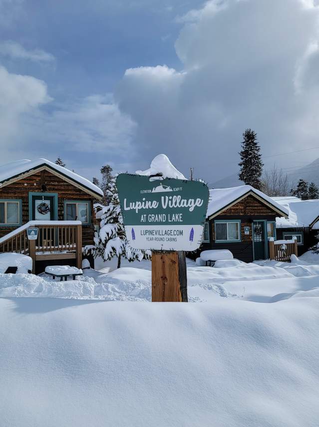 Quaint cabins at Lupin Village blanketed in fresh snow
