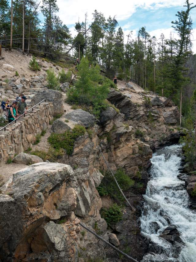 Water rushing over Adams Falls in Grand Lake