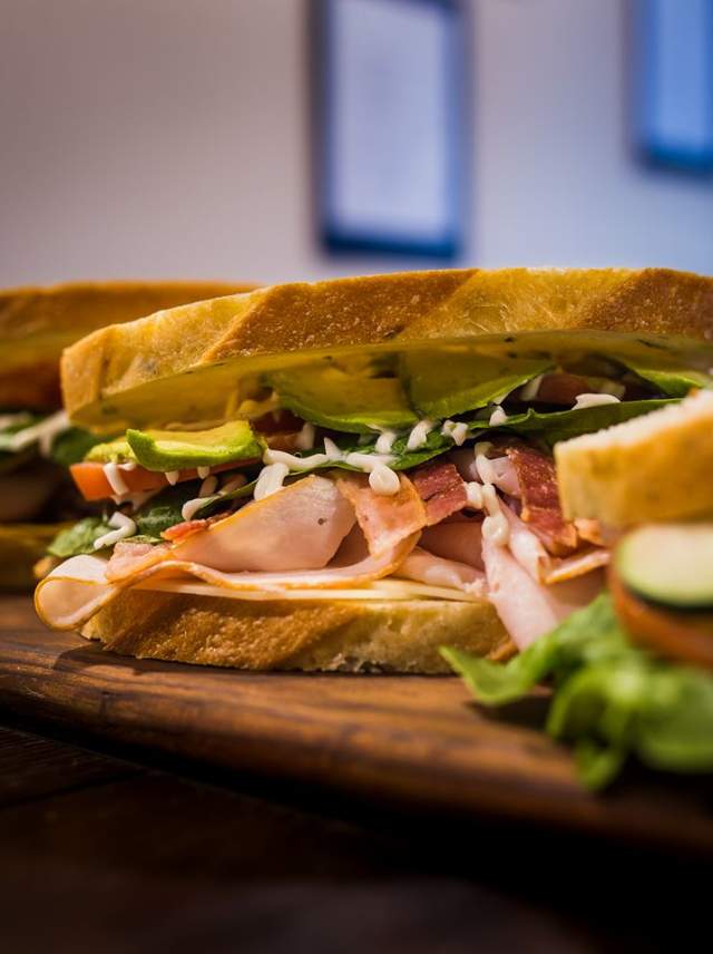 several sandwiches on a table