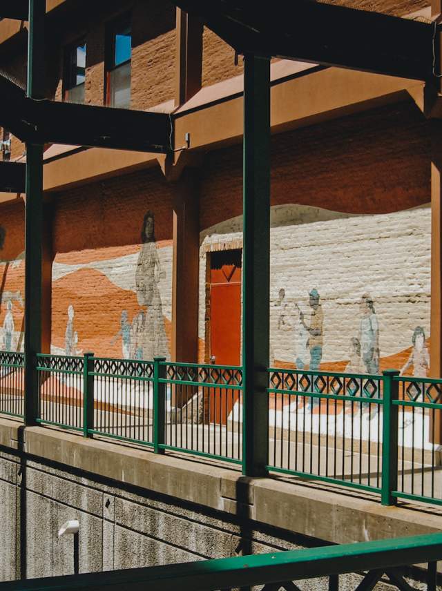 Mural painted on the side of a brick building