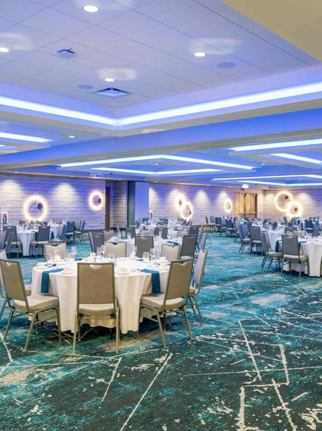 Tables set up in a hotel's meeting room