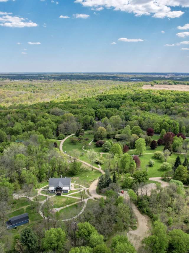 Aerial View of house in the woods