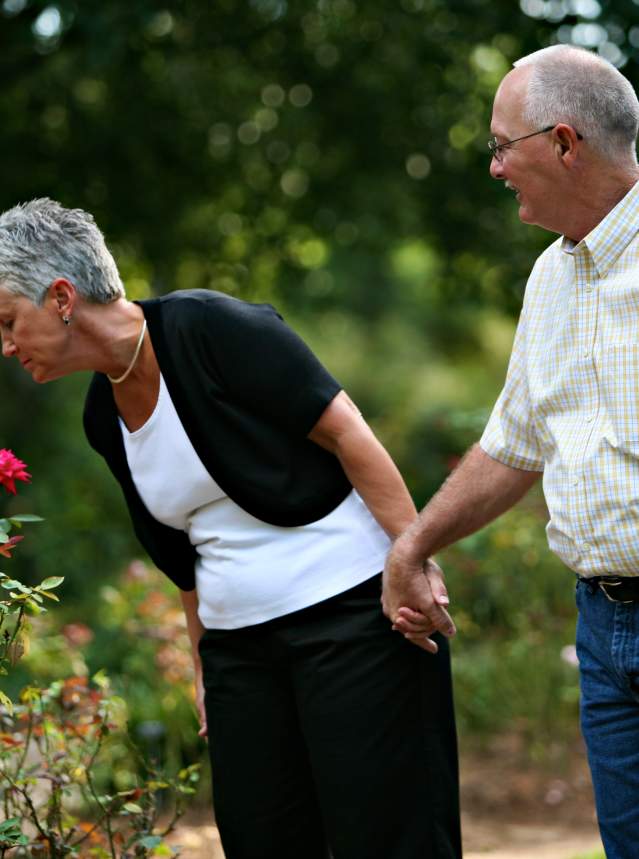 mature couple strolling the gardens at American Rose Center