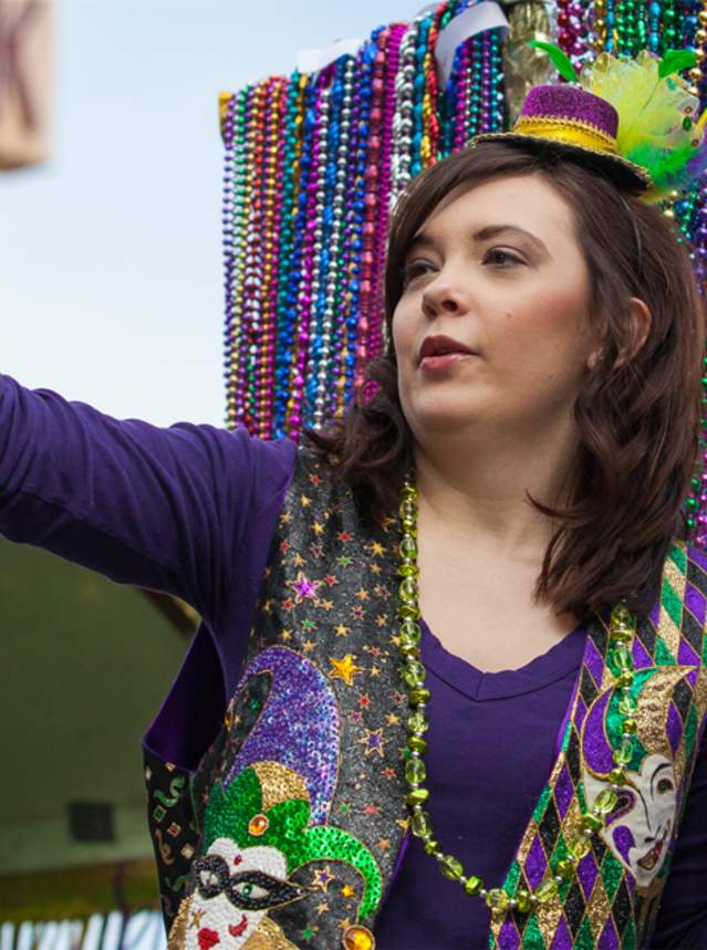 A photo of a Mardi Gras float rider