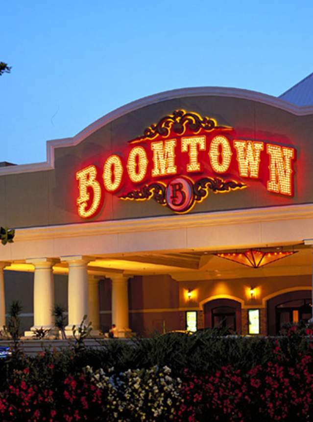 night view of the lighted front of Boomtown Casino and Hotel Bossier