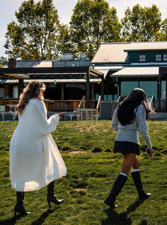 Women walking to a winery
