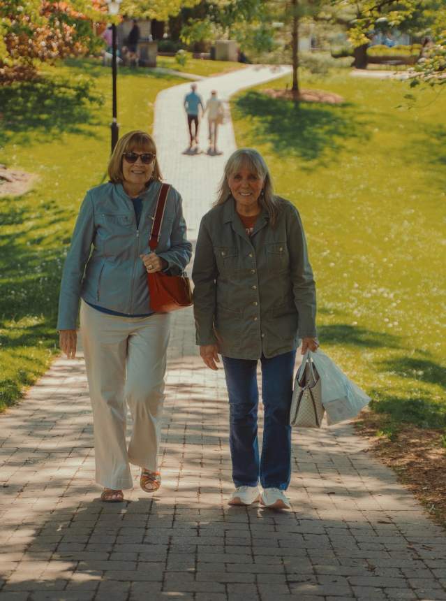 Old women walking on a park