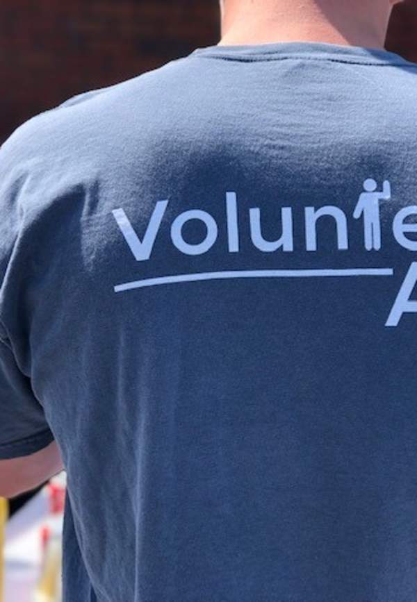 the back of a volunteer Auburn-Opelika shirt