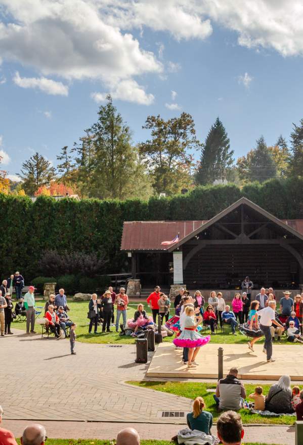 A large group of people attending the Highlands Heritage Jamboree in Kelsey-Hutchinson Park in Highlands, North Carolina.