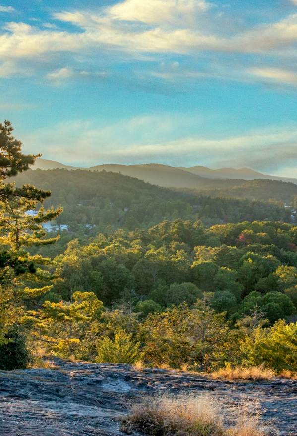 The sun setting behind mountains in Highlands, North Carolina.