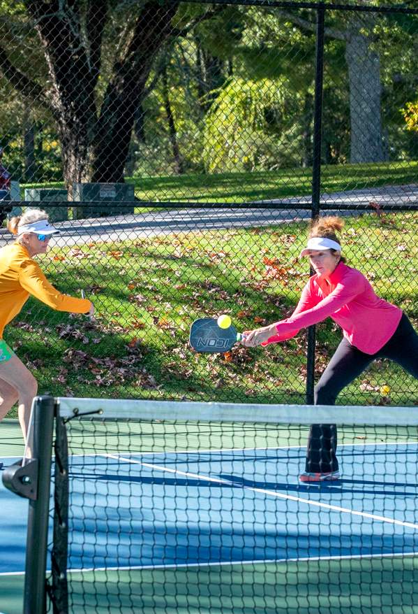 Two women playing pickleball in Highlands, North Carolina