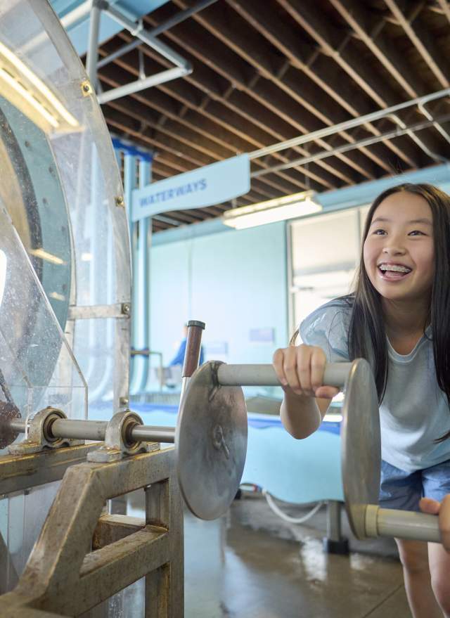 Young girl playing at Impression 5 Science Center