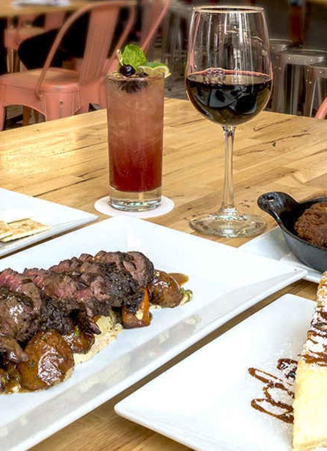 a table set with food at a restaurant in mobile al