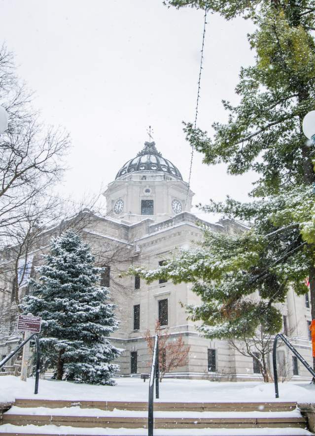 The Monroe County Courthouse covered in snow