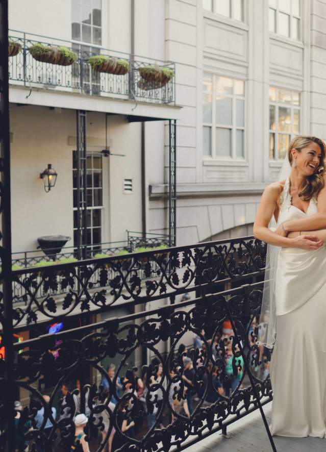 LGBT brides on balcony