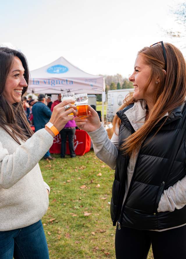 People raise a glass to Bonfires, Barrels & Brews