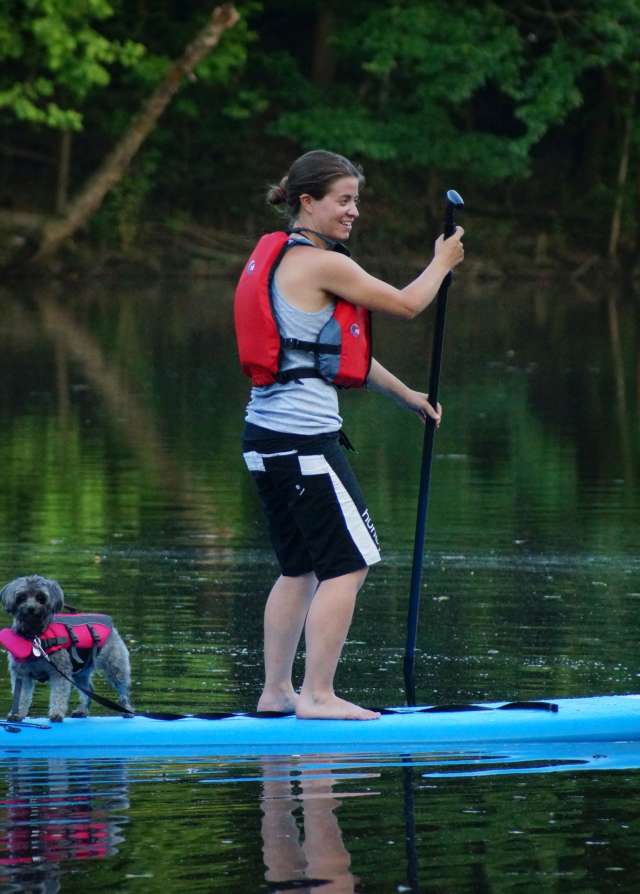 Paddle boarding with Dog