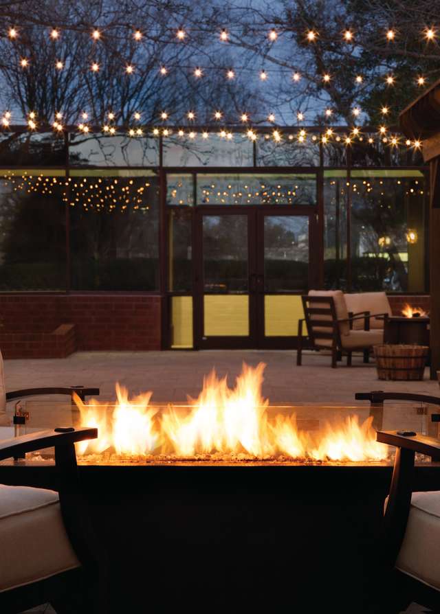 Hilton Greenville Chairs by Fire on Patio