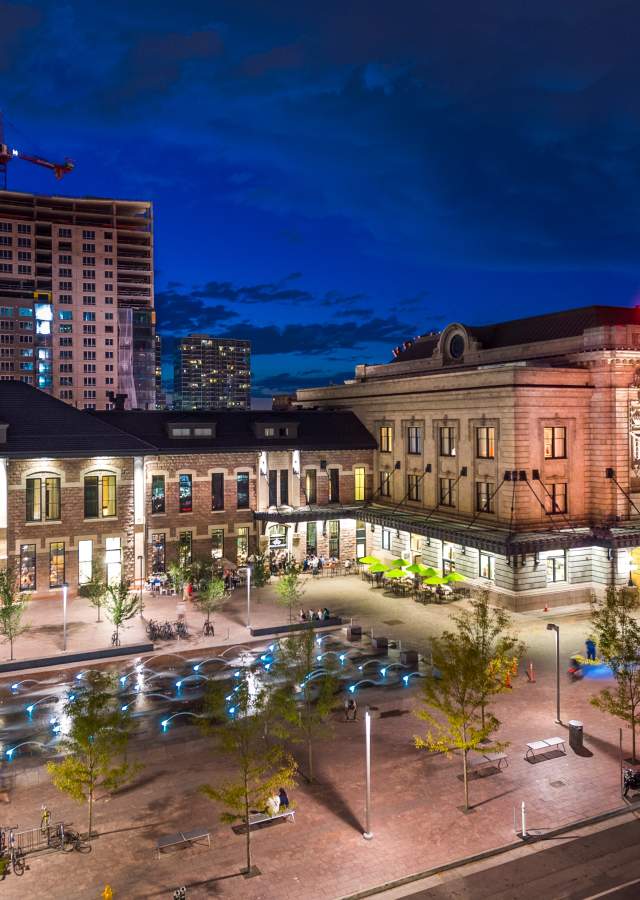 Denver Union Station all lit up at dusk