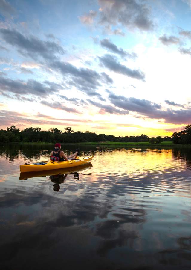 Visitors kayaking on Waterloo Lake in Denison, Texas