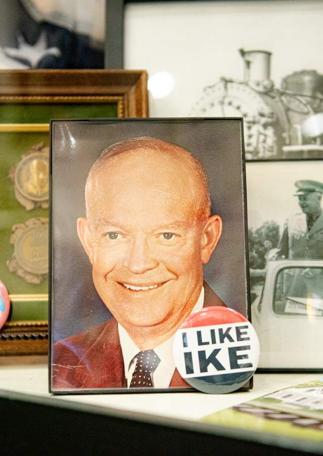 Historic photograph of President Eisenhower displayed inside the Red River Railroad Museum