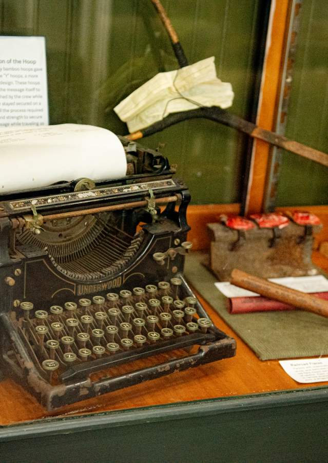 Vintage typewriter display inside the Red River Railroad Museum