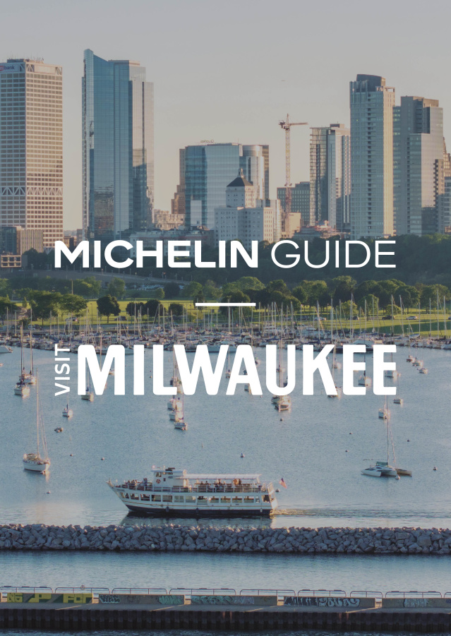 a milwaukee skyline with two logos overlayed