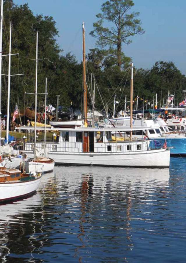 Boats at the pier at St. Tammany Wooden Boat Festival in Madisonville