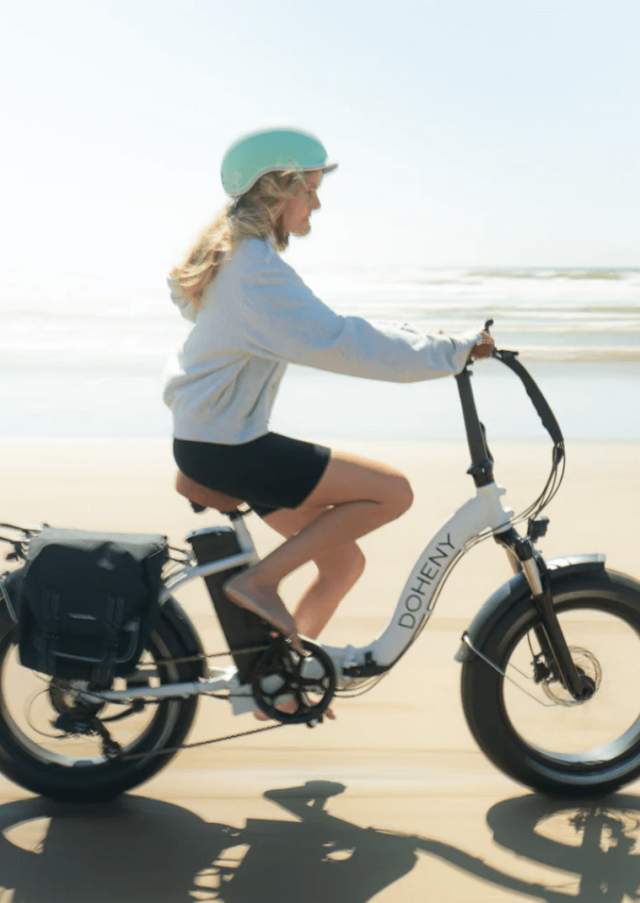Woman Electric Bicycle Beach