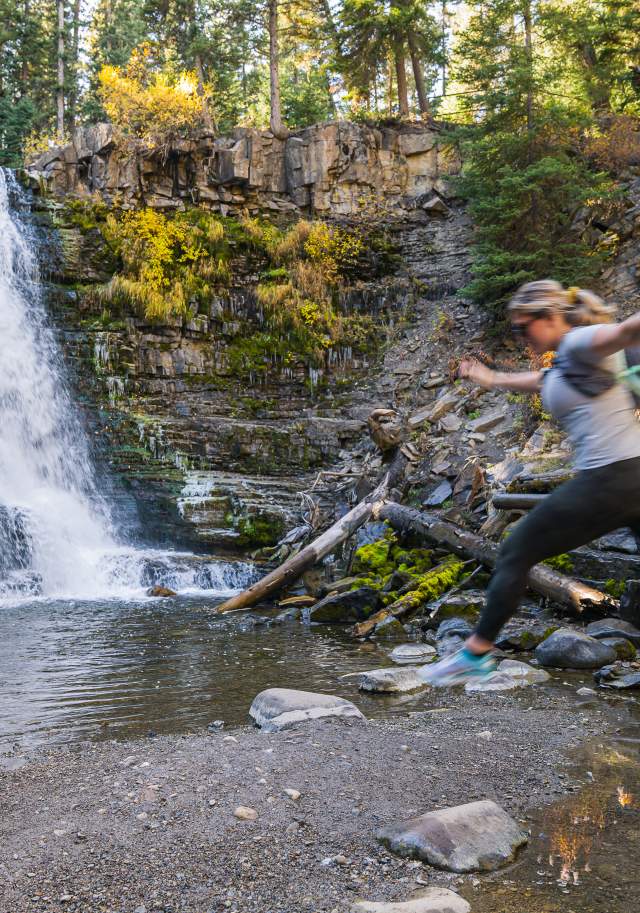 Girl Jumping at Ousel Falls