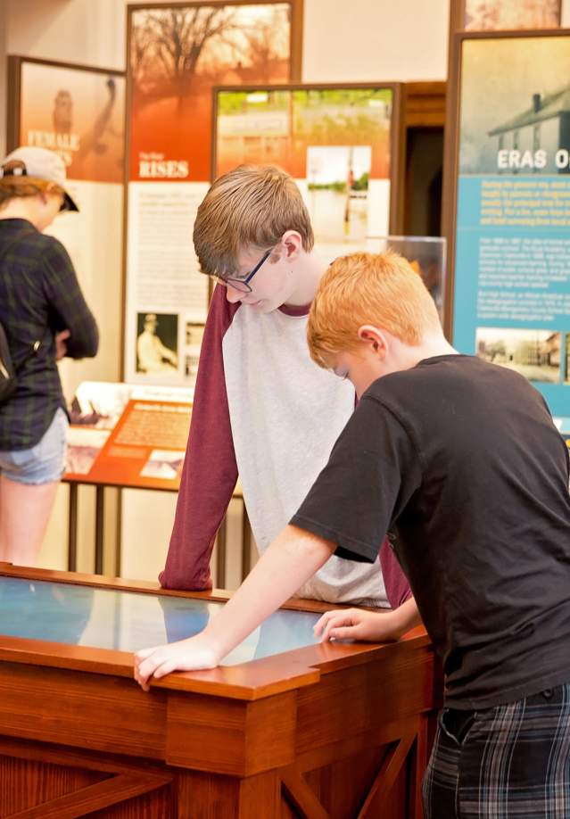 children enjoy a museum exhibit
