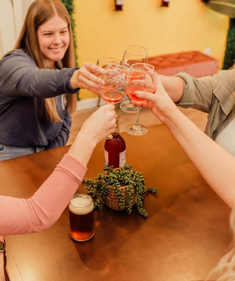 Friends drinking wine at WaterTower Winery