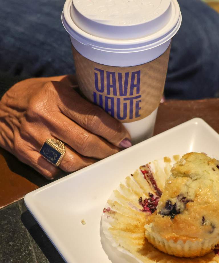 Java Haute coffee with hand