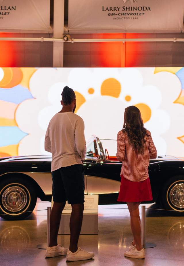 Patrons viewing Corvette in Museum