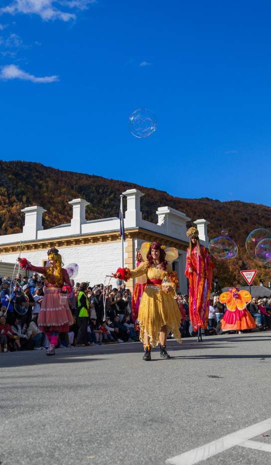Colourful street entertainment at the Arrowtown Autumn Festival Annual Parade