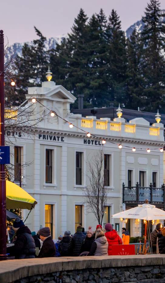 Queenstown Winter Markets at dusk with The Remarkables as a backdrop