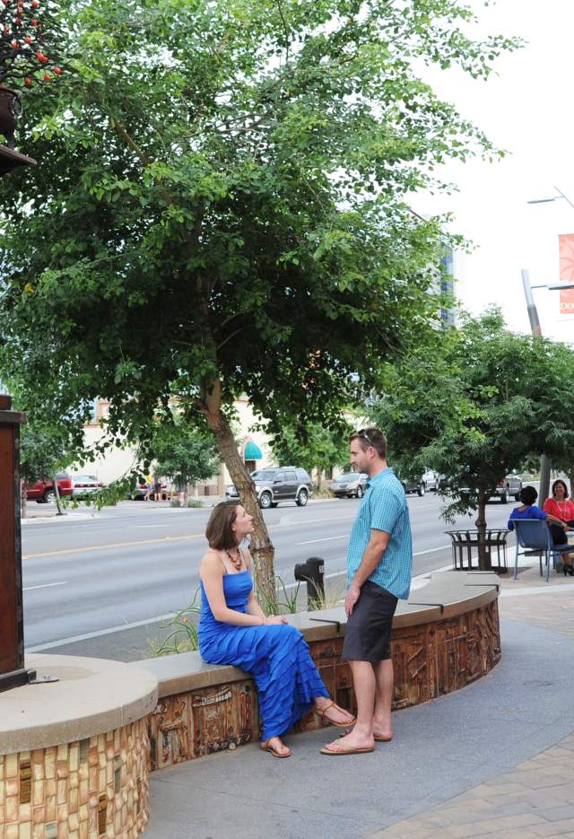 People Sitting On Downtown Chandler's Tree-lined Walkways