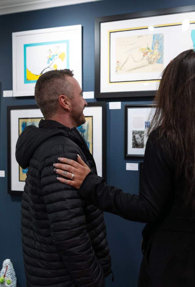 Couple Viewing Art at Art Lovers Gallery