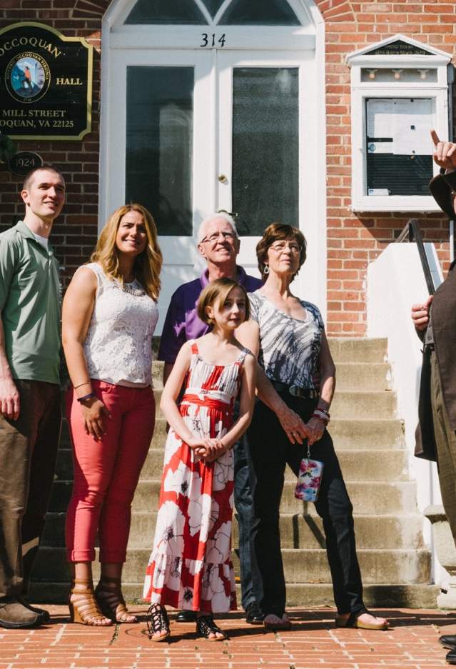 A family in front of town hall in Occoquan