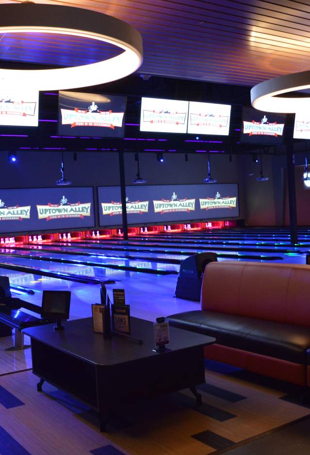An interior shot with bowling lanes at Uptown Alley, inside Manassas Mall.